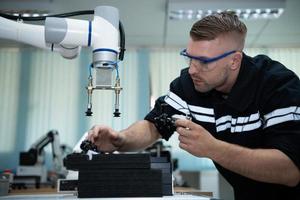 Students studying robotic hand technology are learning how to construct robotic hands for a range of industrial uses. photo