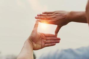 close up woman make hand framing gesture distant view. business concept photo