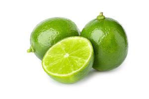 two lime with half  isolate on white background photo