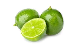 two lime with half  isolate on white background photo