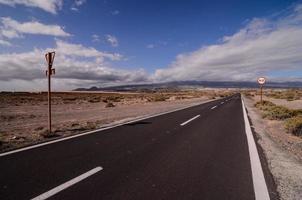 Road through the scenic landscape photo