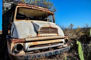 Abandoned rusty vehicles photo