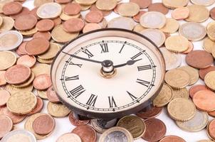 Clock and coins photo