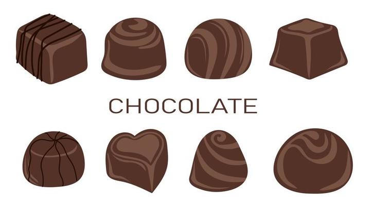 Chocolate candies and comfits sweets on a white background