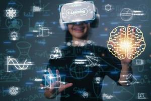 Little girl with VR glasses holding a brain icon and studying exact mathematical sciences on a futuristic virtual interface screen. photo