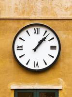 Vintage clock on wall photo