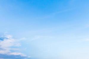 White fluffy clouds in the blue sky photo