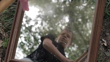 Young Man, Teen Boy Smashes Mirror Glass video