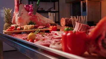 Wide range of processed and raw meat chunks on the table. video