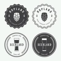 Set of vintage beer and pub logos, labels and emblems with bottles, hops, and wheat vector