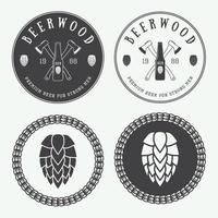 Set of vintage beer and pub logos, labels and emblems with bottles, hops, and wheat vector