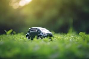 electric car with green leaf icon on blur grass background, ecology and environment concept photo