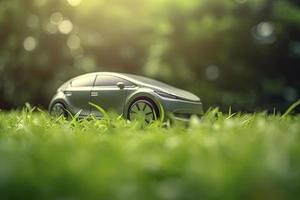 eléctrico coche con verde hoja icono en difuminar césped fondo, ecología y ambiente concepto foto