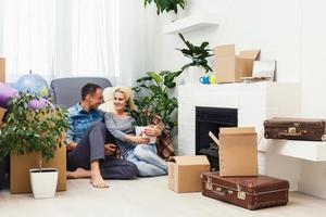 Young couple checklist with cardboard box at home - Business online and delivery concept photo