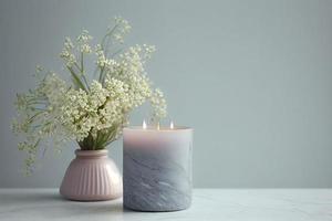 with a lot of copy space, nice gentle background with gypsophila flowers and candle on marble background photo