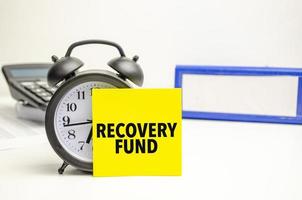 Retro alarm clock and the text recovery fund photo