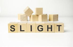 slight word made with building blocks photo