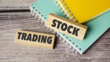 stock trading symbol. Concept words we payday loans on wooden blocks. photo