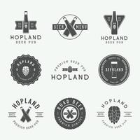 Set of vintage beer and pub logos, labels and emblems with bottles, hops, wheat and design elements vector