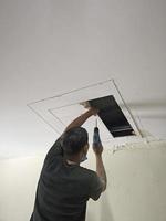 Workers dismantle the ceiling, open the ceiling photo