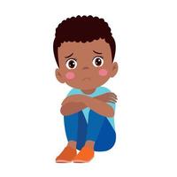 unhappy boy sitting with hands on knees vector