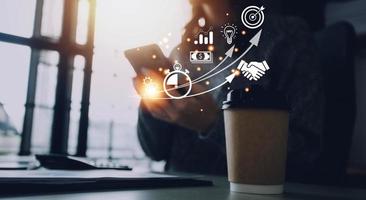Startup concept with icon business and network connection on modern virtual interface from digital tablet. man touching on tablet. online business, e-comers, online marketing photo