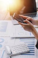 Close up bookkeepers working with balance sheet to analyze problems and find solutions to bringing develop business organization and company's stock market system. Common stock and preferred stock. photo