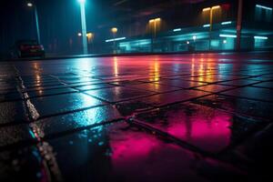 Wet asphalt floor with neon reflection, photo