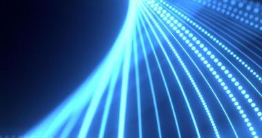 Abstract blue waves from lines and dots of particles of glowing swirling futuristic hi-tech with blur effect on a dark background. Abstract background photo