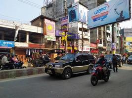 Rangpur, Bangladesh 2023. Political leader. Mayor of Rangpur City with his Government Car. City Street with A lots of people.Administration of Bangladesh at Rangpur city. photo