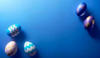 Easter eggs on a blue background with a place for your text photo