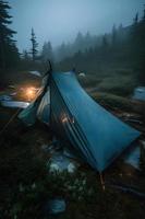 Wilderness Survival. Bushcraft Tent Under the Tarp in Heavy Rain, Embracing the Chill of Dawn. A Scene of Endurance and Resilience photo