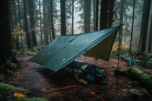 Wilderness Survival. Bushcraft Tent Under the Tarp in Heavy Rain, Embracing the Chill of Dawn. A Scene of Endurance and Resilience photo