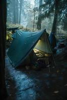 Wilderness Survival. Bushcraft Tent Under the Tarp in Heavy Rain, Embracing the Chill of Dawn. A Scene of Endurance and Resilience photo