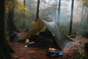 Wilderness Survival. Bushcraft Tent Under the Tarp in Heavy Rain, Embracing the Chill of Dawn. A Scene of Endurance and Resilience photo