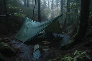 Wilderness Survival. Bushcraft Tent Under the Tarp in Heavy Rain, Embracing the Chill of Dawn. A Scene of Endurance and Resilience photo