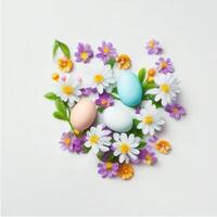 Easter eggs and flowers on a white background. Top view. . photo