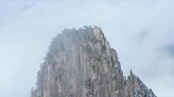 The beautiful mountains landscapes with the green forest and the erupted rock cliff as background in the countryside of the China photo