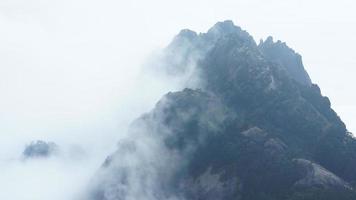 The beautiful mountains landscapes with the green forest and the erupted rock cliff as background in the countryside of the China photo