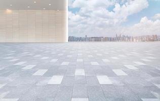 Empty brick floor square floors with panoramic views of the city skyline and buildings photo