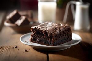 Delicious homemade chocolate brownie in white ceramic plate on rustic wooden table. . Selective focus photo