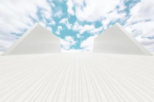 Under the blue sky the lines extend longitudinally to the unmanned square and the symmetrical wall facade photo