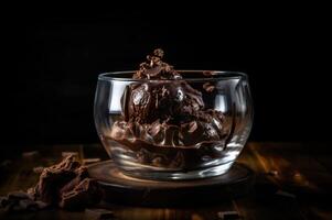 Gourmet chocolate ice cream in glass bowl on ice cream parlor table. Rustic wood. . frozen dessert photo