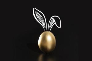 Happy Easter, Rabbits's ears, gold eggs. photo