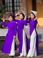 Hue, Vietnam, 2023 - Three generations of Vietnamese women in Hue, Vietnam photo