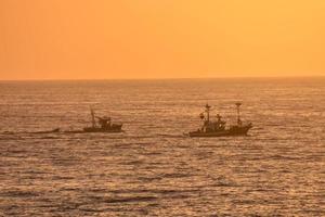 Sunset over the sea photo