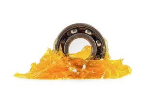 Grease and ball bearing  isolated on white background with clipping path, lithium machinery lubrication for automotive and industrial. photo