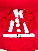 Santa Cloth for young children, insulated with a red background photo