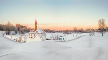 Ice slides in an empty winter park at old Maltese palace in beautiful natural landscape. Gatchina. photo