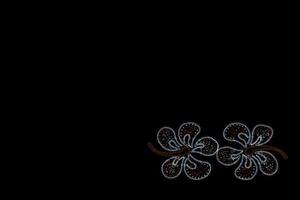 light ornament decorative background on black night background photo